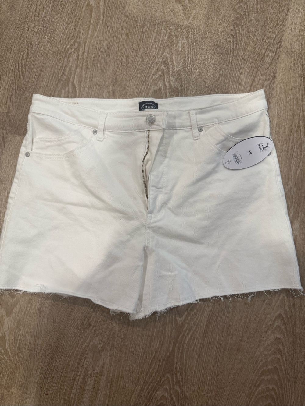 White High-Rise Raw Hem Denim Shorts